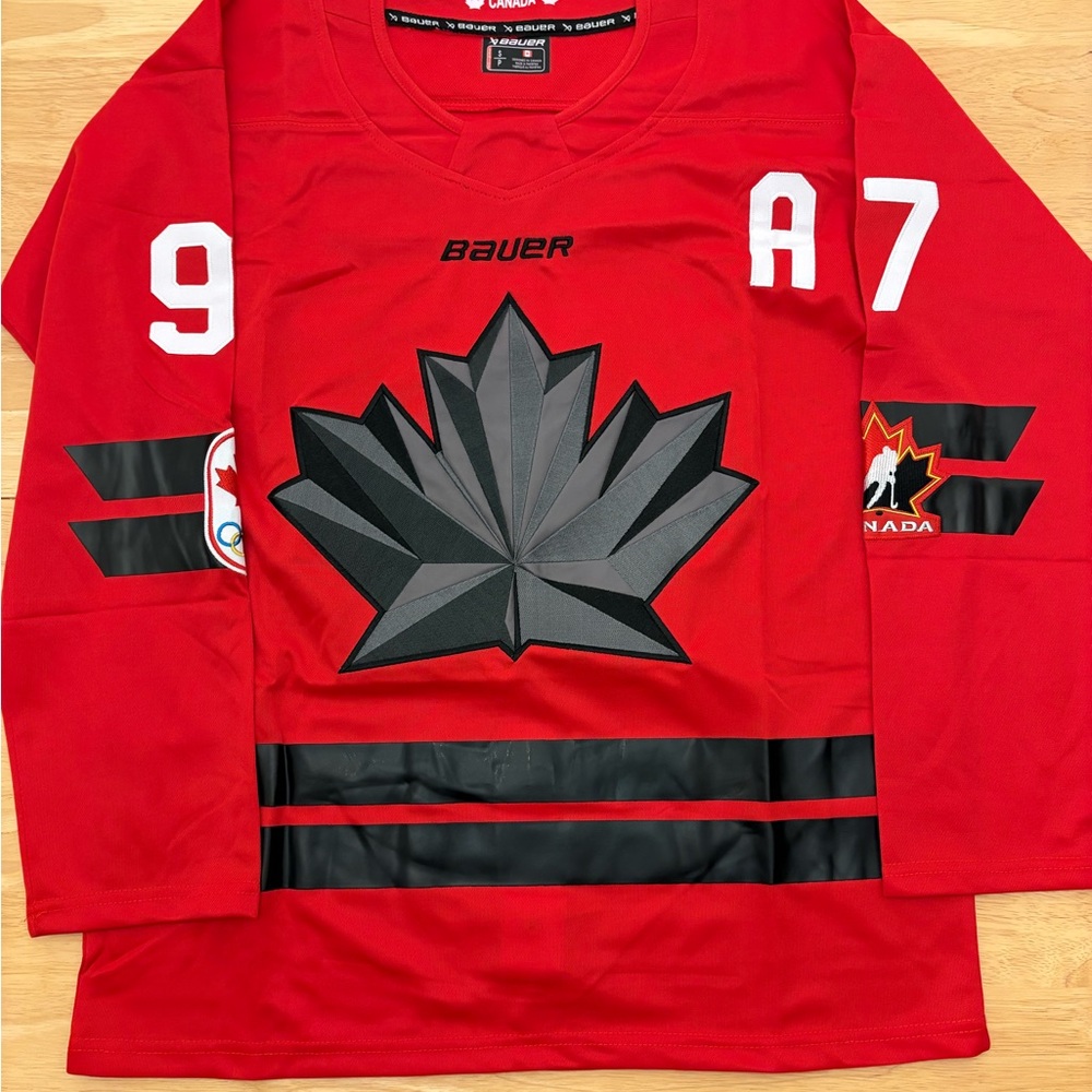 Conor McDavid 2026 Olympics Team Canada Hockey Jersey with fight strap.